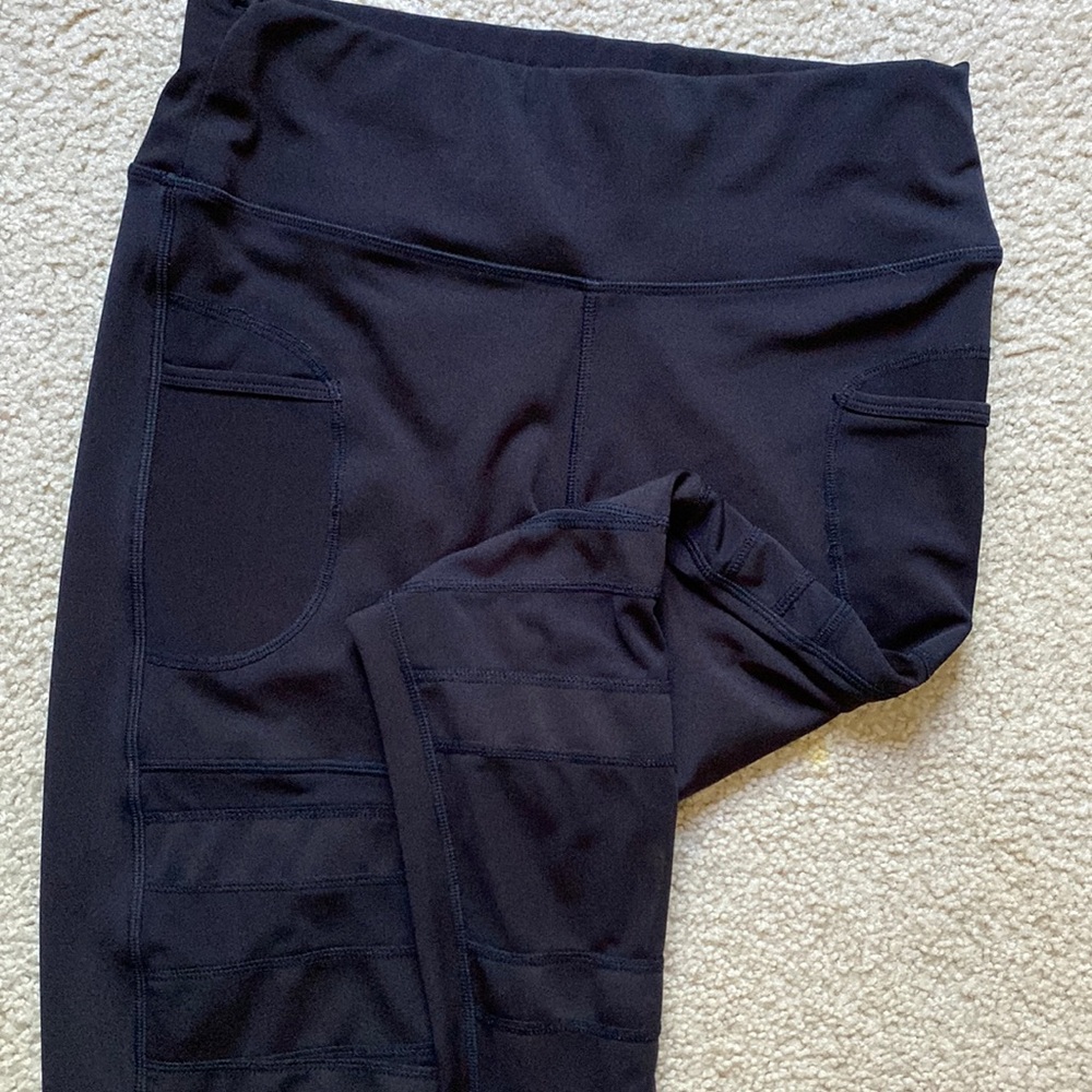 Leggings with pockets mesh cut outs down the leg